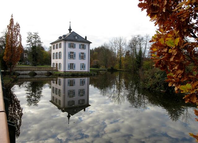 Spiegelungen am herbstlichen Trappensee