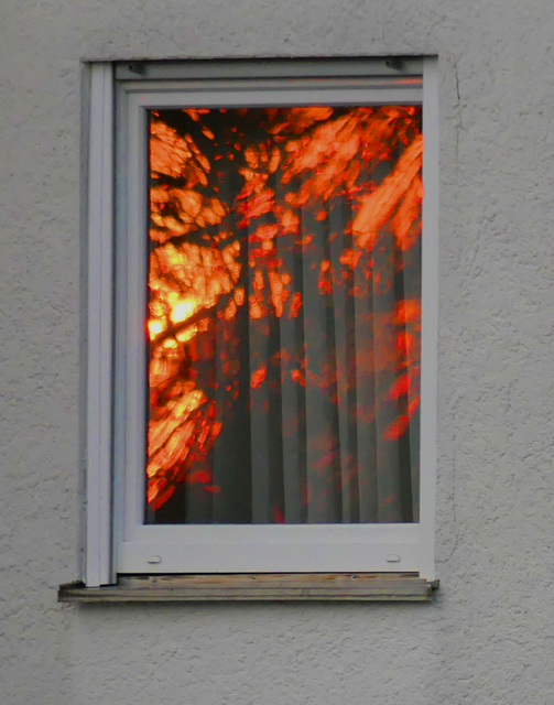 Sonnenuntergang in Nachbars Fenster