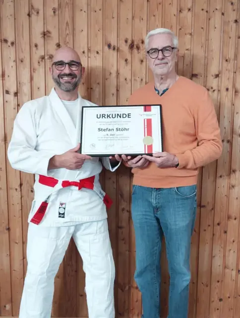 Stefan Stöhr (BCH Lauffen) mit JJVW-Präsident Volkmar Baumbast | Foto: Jonas Zimmer