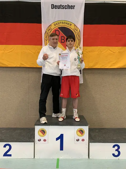 Foto: Trainer + Athlet