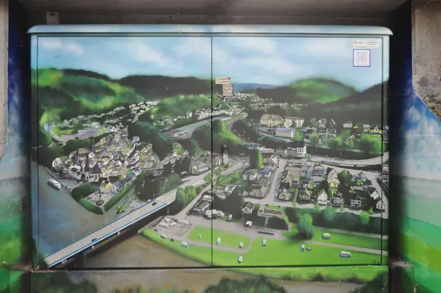 Neckargemünd. An diesem Ort fließt die Elsenz in den Neckar. Hier ein Stadtporträt auf einem Stromverteilerkasten. Schön zu sehen, dass immer mehr Städte diese tolle Idee der Verschönerung aufgreifen. | Foto: Daniela Somers